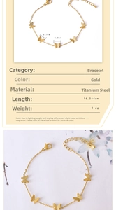 Detail view of a dainty golden titanium steel butterfly charm on a slim adjustable bracelet