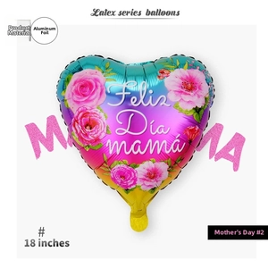 Detail of 18 inch heart-shaped foil balloon with Feliz Día mamá print and rose pattern
