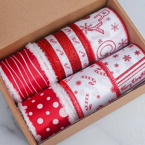 Set of four 6cm wired burlap Christmas ribbons in festive red and white gift box