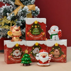 Mini Christmas figurines set with reindeer, snowman and Santa Claus in gift boxes