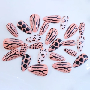 Short almond animal print press-on nails with leopard and zebra patterns in pink and white