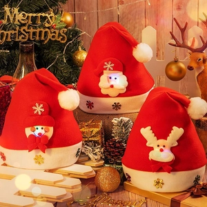 Detail of LED glowing Christmas hats with plush Santa, Snowman, and Reindeer icons