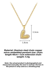Close-up of heart pendant necklace with micro-pave crystals and 2.5cm x 1.8cm dimensions