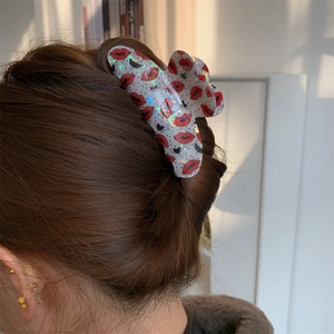 Medium transparent hair claw clip with red lips and black hearts pattern for women
