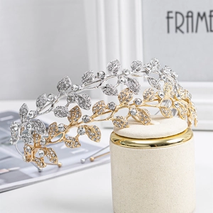 Elegant leaf-shaped crystal bridal crown tiara in gold and silver for weddings