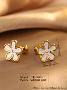 Macro view of gold five-petal flower stud earrings on silk with size and weight info