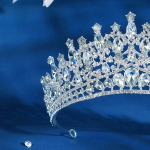 Close-up of elegant bridal crown with sparkling rhinestones on premium velvet background