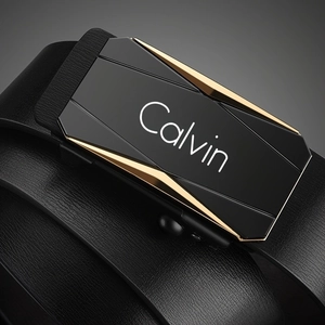 Detail of black leather belt with a matte black automatic metal buckle featuring Calvin logo