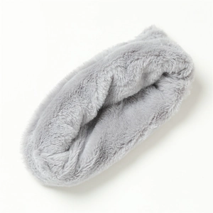 Detail view of a soft grey faux rabbit fur neck warmer with plush texture on white background