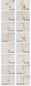 Collection of gold titanium steel heart and butterfly necklaces with elegant enamel charms