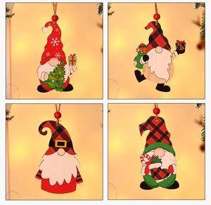 Detailed view of four colorful wooden Christmas gnome ornaments with hanging ropes and beads
