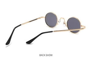 Rear view of vintage round sunglasses showing gold metal frame and dark grey lenses
