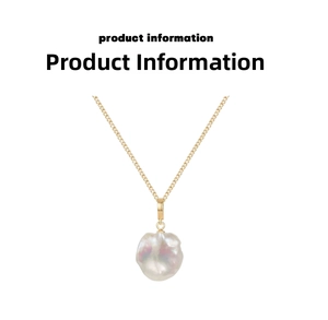 Macro detail of natural baroque pearl with iridescent luster on a thin gold chain