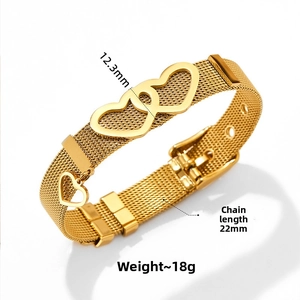 Detail of gold woven mesh strap bracelet with hollow double heart design and charm