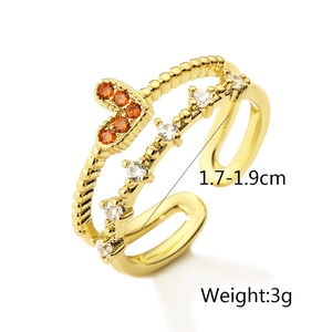 Detail of gold plated heart ring with orange zircons and 1.7-1.9cm inner diameter size