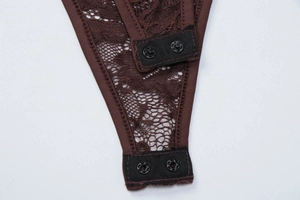 Detail of dark brown lace bodysuit featuring secure snap button closure and mesh texture