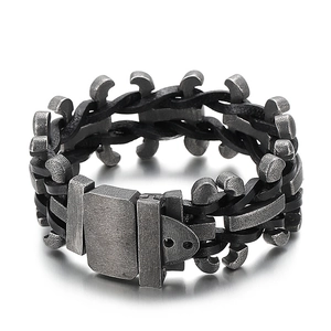 Industrial vintage men's braided leather bracelet with retro silver metal hardware