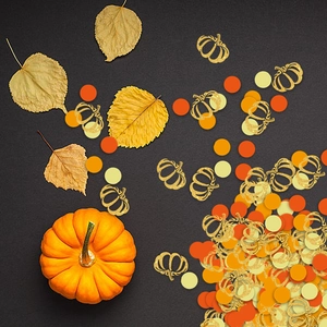 Thanksgiving pumpkin confetti set with orange and gold glitter pieces for autumn party decor
