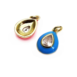 Detailed view of blue enamel teardrop pendant with gold plating and clear zircon stone