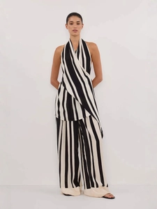 Elegant black and white striped halter top and wide-leg pants set for women