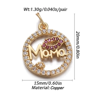 Close-up of gold-plated Mama pendant with rose red and white cubic zirconia stones