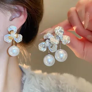 Elegant gold-plated petal stud earrings with large round pearl drops for women