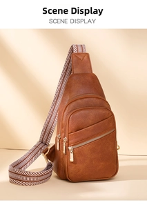 Close-up of brown litchi pattern leather cross-body bag with geometric strap