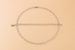 Close-up of a silver double-layered O-chain necklace with two secure lobster clasps