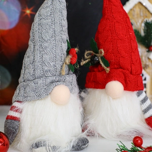 Set of two glowing Christmas gnomes with knit hats and warm LED lights decor