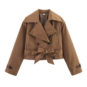 Brown double-breasted short trench coat with bow belt and lapels, flat lay view