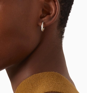 Close-up of gold-plated S925 sterling silver C-shaped earrings with micro-pave cubic zirconia