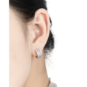 Silver S925 sterling silver honeycomb earrings with micro-set zircon stones on model