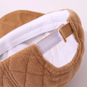 Brown quilted plush baby winter cap with bear ears and adjustable velcro back strap