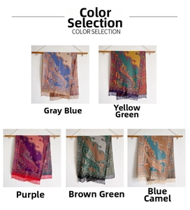 Close-up of ethnic paisley pattern jacquard shawl with fringe edges in multi-color options