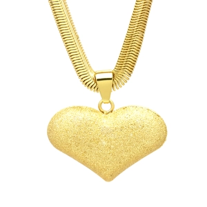Macro detail of wide golden herringbone chain with matte finish heart pendant
