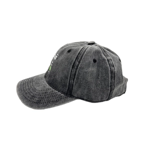 Detail view of washed dark grey baseball cap featuring vintage embroidery and curved brim