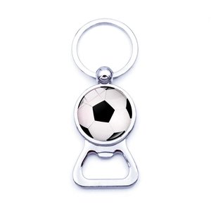 Detailed view of silver metal soccer ball keychain bottle opener on white background