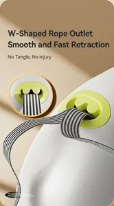 Detail of automatic retractable pet leash with green anti-tangle outlet and nylon rope