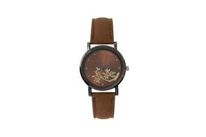 Détail du cadran floral en bronze avec strass et aiguilles bleues sur montre pour femme