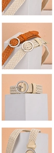 Detail of orange and beige braided wax rope belts with round silver buckles