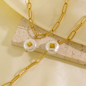 Baroque pearl necklace with sun star motifs on paperclip chain 14K gold plated