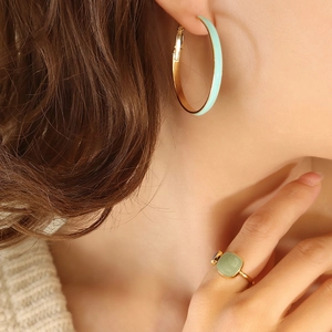 Chic gold hoop earrings with mint green enamel and matching square gemstone ring