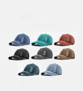 Detail showing various colors and distressed texture of vintage denim baseball caps