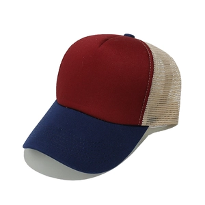 Detailed macro view showing the breathable mesh and contrast stitching on the trucker hat
