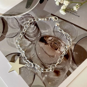 Detail of S925 sterling silver star pendant bracelet with O-ring chain and lobster clasp