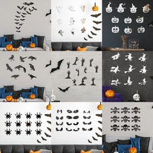 Detailed grid showing glowing Halloween bat ghost and pumpkin wall stickers for window decor
