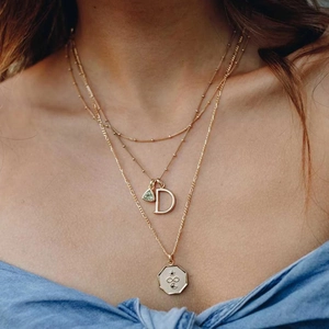 Three-layer gold necklace set with letter D pendant and green stone for women