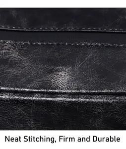 Detail of premium PU leather travel bag showing durable double-needle stitching and texture