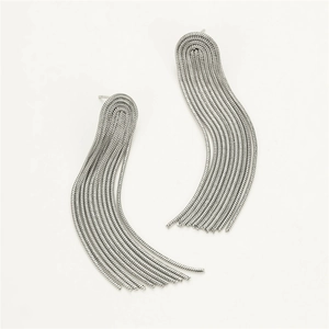 Detailed view of long silver snake chain tassel earrings with metallic texture