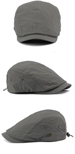 Detail of grey lightweight flat cap featuring waffle texture fabric and adjustable drawstring